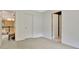 View of the bedroom featuring two closets, access to the hallway and bathroom at 104 Hidden Springs Ln, Peachtree City, GA 30269