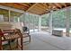 Covered patio space with a view of the backyard and swimming pool at 104 Hidden Springs Ln, Peachtree City, GA 30269