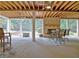 Covered patio with an exposed ceiling and fireplace at 104 Hidden Springs Ln, Peachtree City, GA 30269