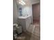 Modern bathroom features a vanity and mirror at 2757 Malton Way, Loganville, GA 30052