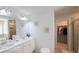Bathroom with double vanity, standing shower, and walk-in closet at 2757 Malton Way, Loganville, GA 30052