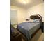 Bedroom with a gray accent wall and a large bed, offering a relaxing retreat at 2757 Malton Way, Loganville, GA 30052
