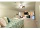 Bedroom featuring a queen bed and sitting area with a TV at 2757 Malton Way, Loganville, GA 30052