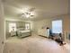 Bedroom features exercise equipment and a queen bed at 2757 Malton Way, Loganville, GA 30052