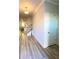 Inviting foyer with light wood floors, leading to the main living area and staircase at 2757 Malton Way, Loganville, GA 30052