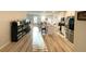 Open-concept living area with view of kitchen, dining area and stainless appliances at 2757 Malton Way, Loganville, GA 30052