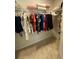 Walk in closet with shelving containing clothes and bedding, and carpet flooring at 2757 Malton Way, Loganville, GA 30052