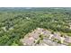 Aerial view of a private community surrounded by verdant woods at 2855 Middlecreek Way # 2855, Cumming, GA 30041
