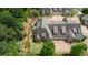 Aerial view of the property highlighting its well-maintained grounds, multi-car garages, and desirable neighborhood setting at 2855 Middlecreek Way # 2855, Cumming, GA 30041