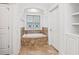 Luxurious bathroom featuring a tiled-in tub with a stained glass window and tile floor at 2855 Middlecreek Way # 2855, Cumming, GA 30041