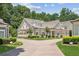 Beautiful neighborhood home featuring a manicured lawn and a two car garage at 2855 Middlecreek Way # 2855, Cumming, GA 30041