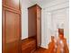 Hallway features hardwood floors and ample built-in storage at 2855 Middlecreek Way # 2855, Cumming, GA 30041