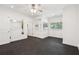 A spacious home gym featuring a ceiling fan, windows and an open layout at 2855 Middlecreek Way # 2855, Cumming, GA 30041