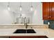 Kitchen featuring stone counters, eat-in bar, and updated stainless steel appliances at 2855 Middlecreek Way # 2855, Cumming, GA 30041