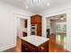 Elegant kitchen island with granite countertop and stainless steel appliances at 2855 Middlecreek Way # 2855, Cumming, GA 30041