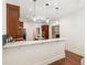 Well-lit kitchen with granite countertop and stainless steel appliances at 2855 Middlecreek Way # 2855, Cumming, GA 30041