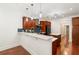 Stylish kitchen with granite countertops, stainless steel appliances and hardwood floors at 2855 Middlecreek Way # 2855, Cumming, GA 30041