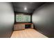 Well-lit office space featuring a built-in desk, ample storage, and neutral carpet flooring at 2855 Middlecreek Way # 2855, Cumming, GA 30041