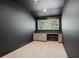 A bright office featuring neutral walls, cabinets, and a built-in desk at 2855 Middlecreek Way # 2855, Cumming, GA 30041