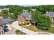 Aerial view of the property next to a lake and golf course at 652 Pathview Ct, Dacula, GA 30019