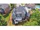 Aerial view of the backyard showing the layout and landscaping at 652 Pathview Ct, Dacula, GA 30019