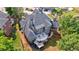 Beautiful aerial view of the deck overlooking the manicured backyard and fenced perimeter at 652 Pathview Ct, Dacula, GA 30019