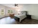 Bedroom featuring hardwood floors, neutral paint, and natural light creating a peaceful retreat at 652 Pathview Ct, Dacula, GA 30019