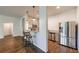 Open concept kitchen with stainless steel appliances, granite countertops, and breakfast bar seating at 652 Pathview Ct, Dacula, GA 30019