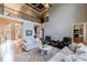 Open-concept living area with two-story ceilings and an upstairs balcony at 652 Pathview Ct, Dacula, GA 30019