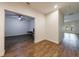 Open living room with luxury vinyl plank flooring and access to a back area at 652 Pathview Ct, Dacula, GA 30019