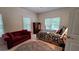 Bright bedroom showcasing a large window, cozy seating, and stylish decor at 3275 Lenox Ne Rd # 110, Atlanta, GA 30324