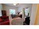 Comfortable bedroom with a four-poster bed, seating area, and an ensuite entrance at 3275 Lenox Ne Rd # 110, Atlanta, GA 30324