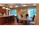 Community dining room featuring a dining table, chairs, and a view of the kitchen at 3275 Lenox Ne Rd # 110, Atlanta, GA 30324