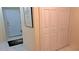 Inviting hallway with closet and artwork leading to a well-lit living space at 3275 Lenox Ne Rd # 110, Atlanta, GA 30324