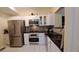 Modern kitchen with stainless steel appliances and granite countertops at 3275 Lenox Ne Rd # 110, Atlanta, GA 30324