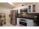 Well-equipped kitchen featuring stainless steel appliances and white cabinets at 3275 Lenox Ne Rd # 110, Atlanta, GA 30324