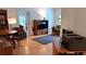Cozy living room featuring hardwood floors and comfortable seating, perfect for relaxation at 3275 Lenox Ne Rd # 110, Atlanta, GA 30324