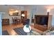 Open concept living space that has a fireplace and hardwood floors at 3275 Lenox Ne Rd # 110, Atlanta, GA 30324