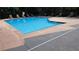 Community swimming pool with lounge chairs and mature trees for shade at 3275 Lenox Ne Rd # 110, Atlanta, GA 30324