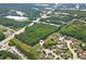 Residential area with lush green spaces, showcasing neighborhood layout and home locations at 466 Sweet Apple Ln, Buford, GA 30518