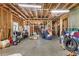 Spacious unfinished basement with exposed framing and high ceilings, offering potential for customization and expansion at 466 Sweet Apple Ln, Buford, GA 30518