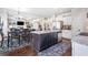Open kitchen with an island, granite countertops, and modern appliances at 466 Sweet Apple Ln, Buford, GA 30518