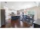 Well-lit kitchen with an island, modern appliances, and a breakfast nook at 466 Sweet Apple Ln, Buford, GA 30518