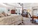 Spacious main bedroom featuring trey ceiling, natural light, ceiling fan and traditional style furniture and decor at 466 Sweet Apple Ln, Buford, GA 30518