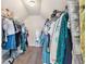 Walk-in closet with clothing racks installed along the walls and plenty of storage space at 466 Sweet Apple Ln, Buford, GA 30518