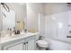 Bright bathroom featuring a bathtub and a sink at 4854 Cathedral Ct, Powder Springs, GA 30127