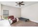 Cozy bedroom featuring a comfortable recliner, perfect for relaxation at 4854 Cathedral Ct, Powder Springs, GA 30127