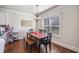 Charming dining room with hardwood floors, natural light, and classic decor at 4854 Cathedral Ct, Powder Springs, GA 30127