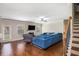 Cozy living room with fireplace, hardwood floors, and access to outdoor space at 4854 Cathedral Ct, Powder Springs, GA 30127