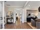 Stunning foyer with hardwood floors, elegant decor, and a view into other rooms of the home at 5430 Hyde Rd, Cumming, GA 30040